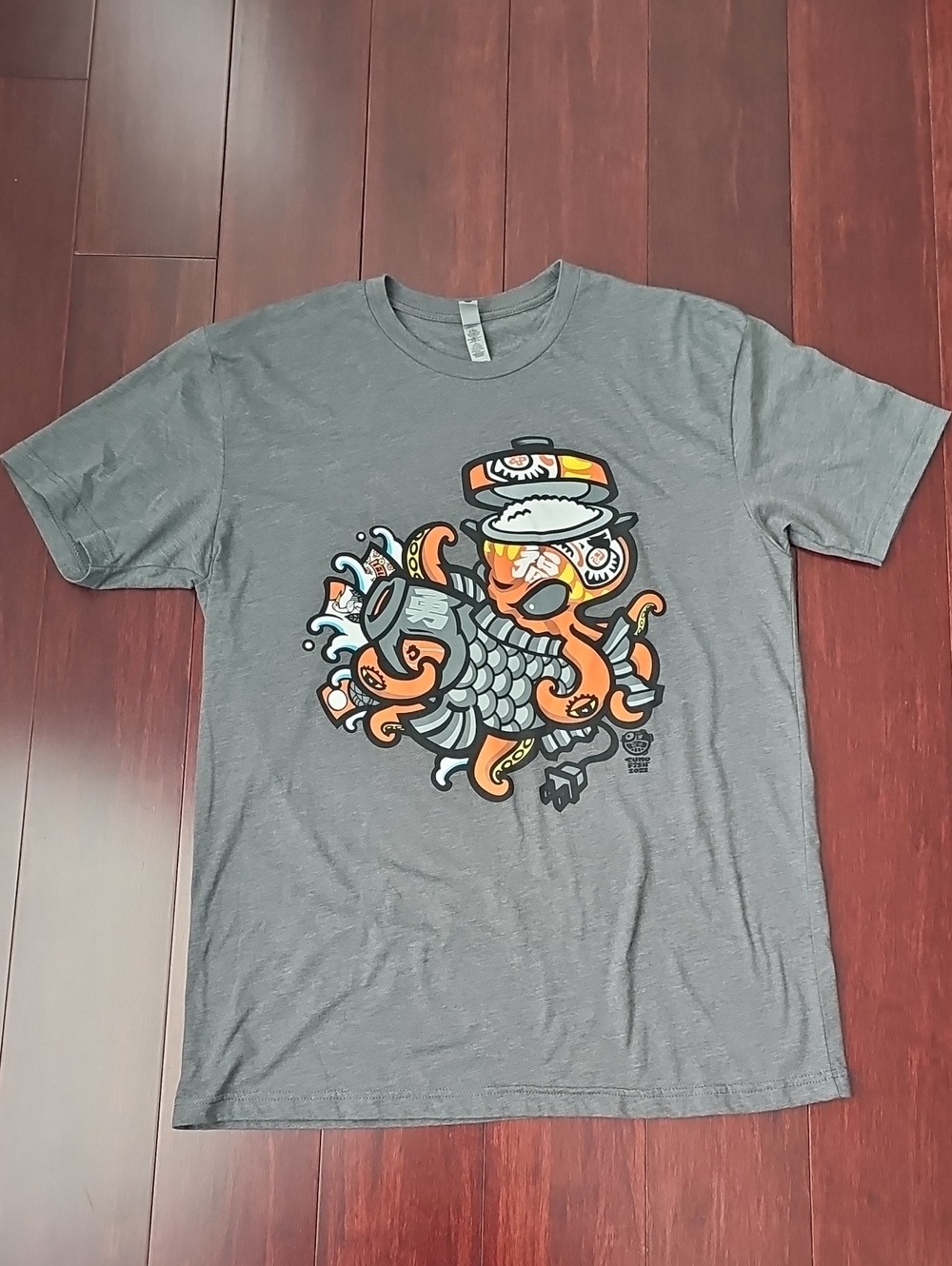 Gray Graphic Tee with Orange Octopus Sushi Design
